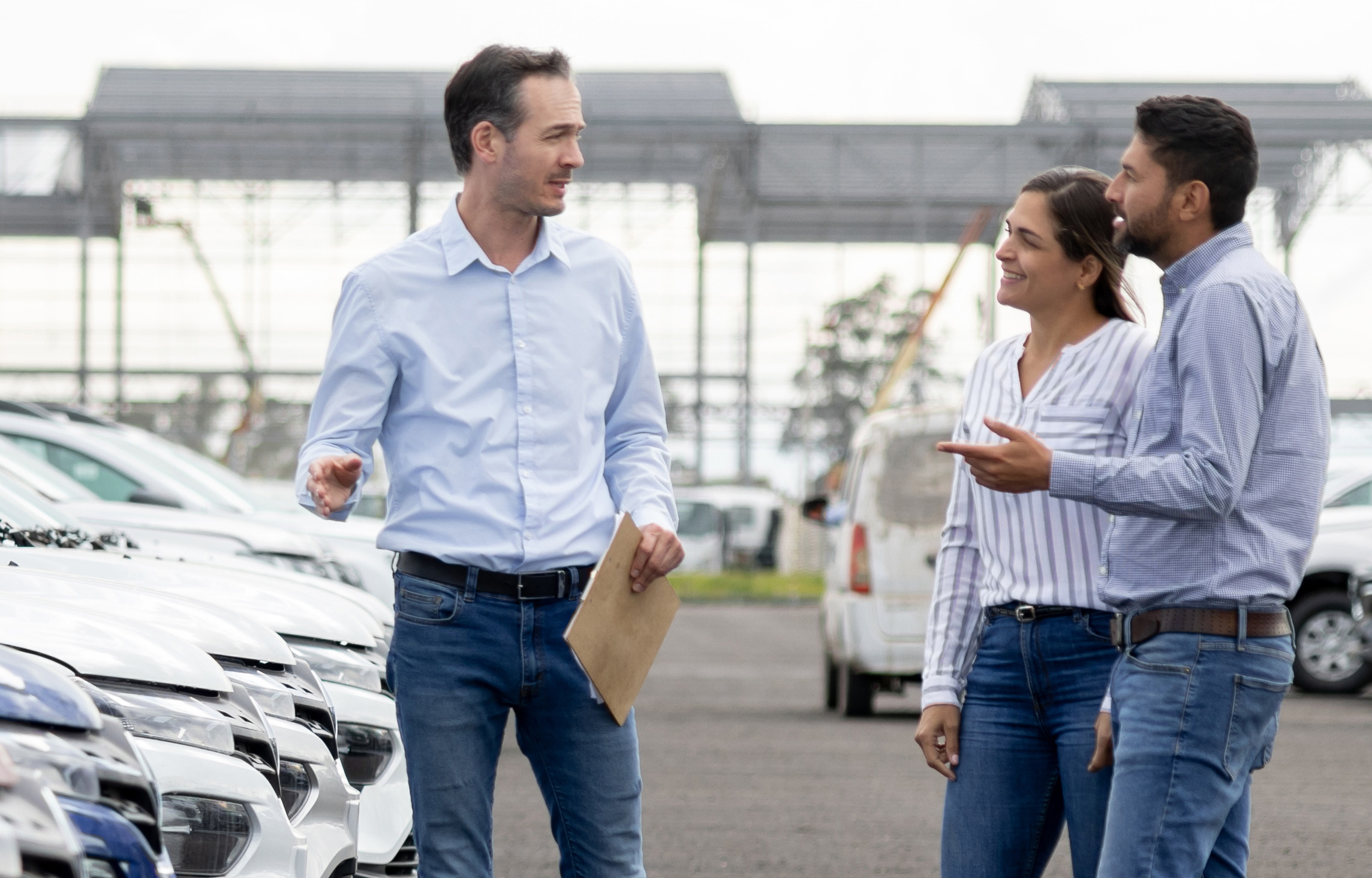 Couple at a Car dealership