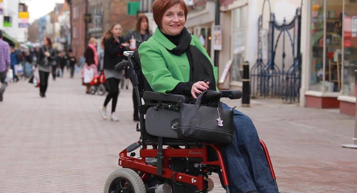 Motability Scheme customer using powered wheelchair